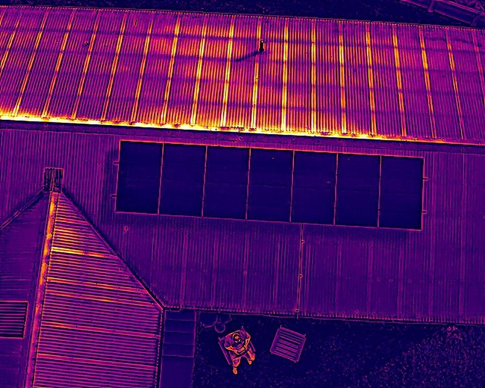 Thermal drone image of a metal roof with a solar array, Waikato