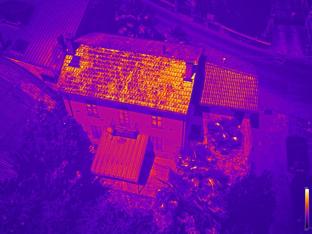 Illustrative thermal drone image of a house roof